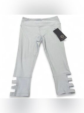 Scorpio Sol cutout leggings. NWT. SIZE S. Light blue